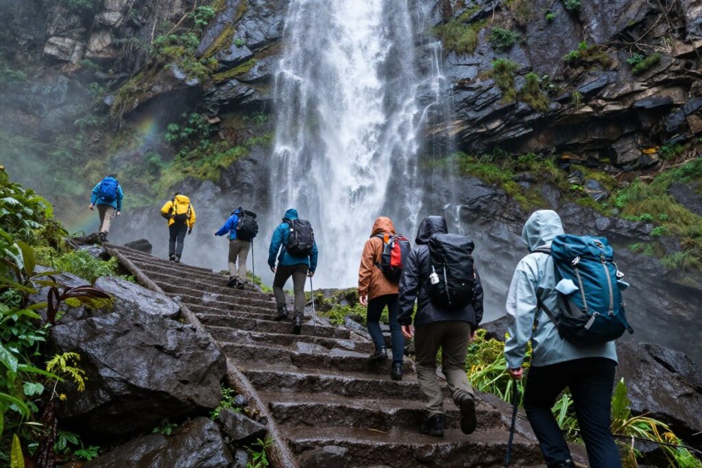 Hikers on Mist Trail with Vernal Fall spray